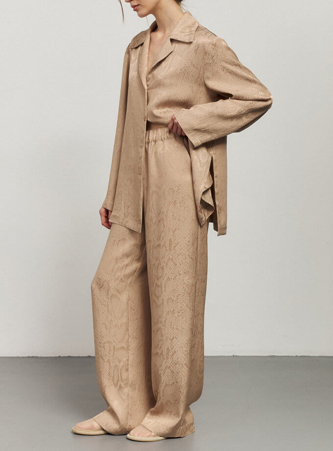 Бежеві штани з анімалістичним принтом рептилія KOLOSOVA (KLSVSUM243)